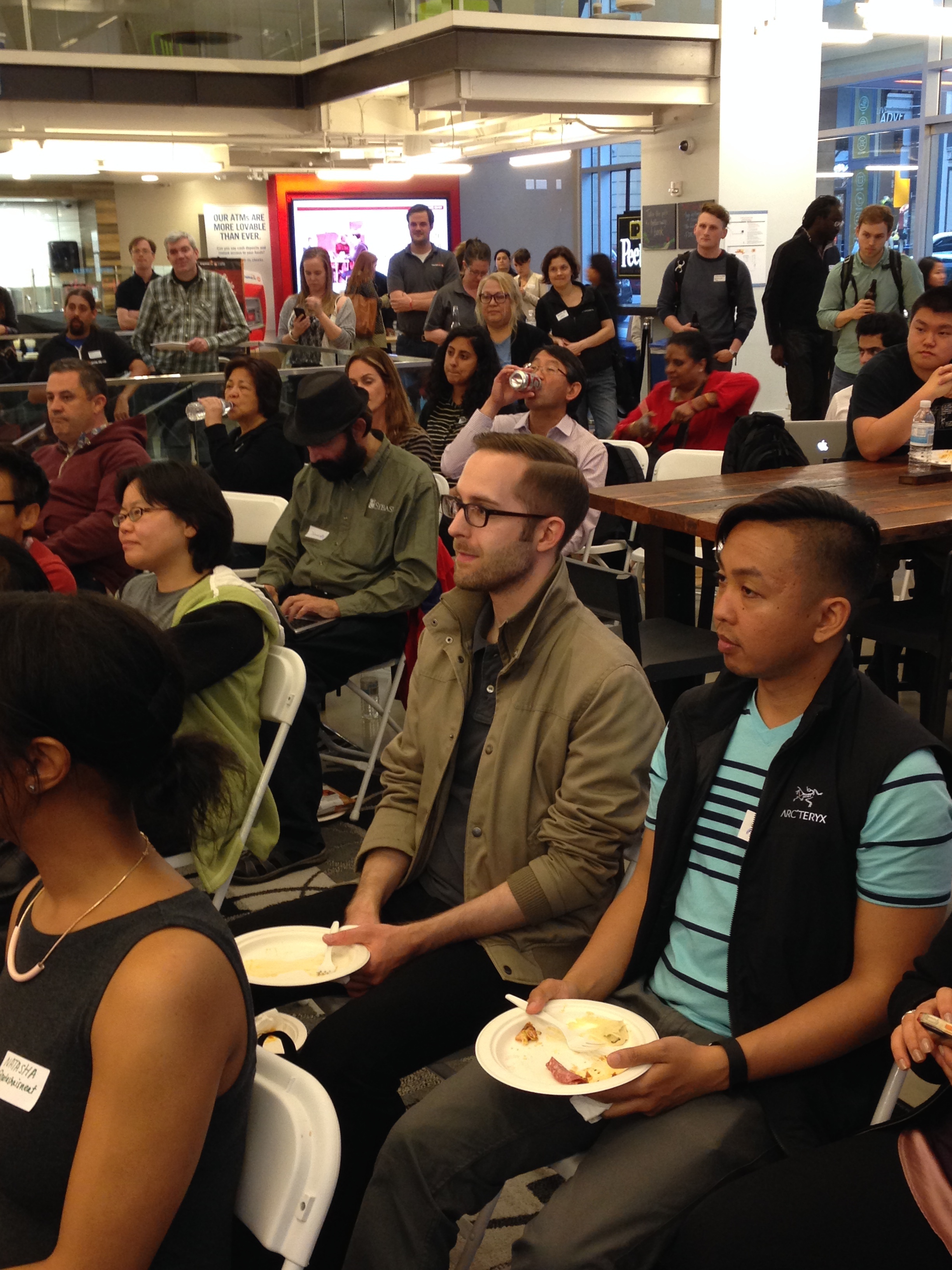 The crowd listens to opening day presentations